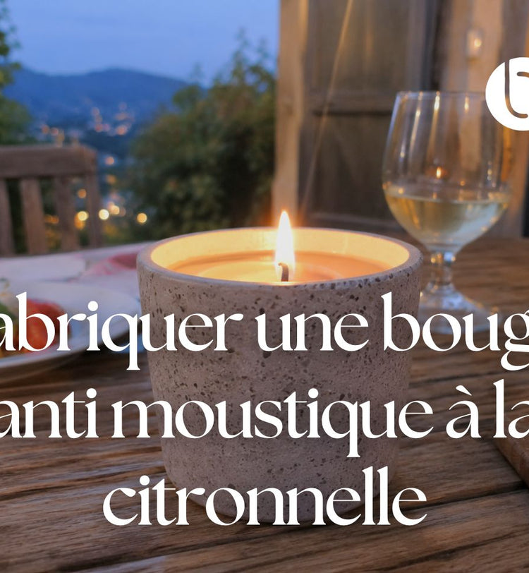 Bougie anti-moustique allumée sur une table en bois en extérieur pendant une soirée d’été