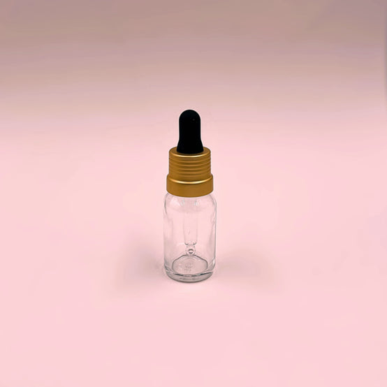 Flacon compte-gouttes transparent en verre de 15 ml avec pipette noire et or